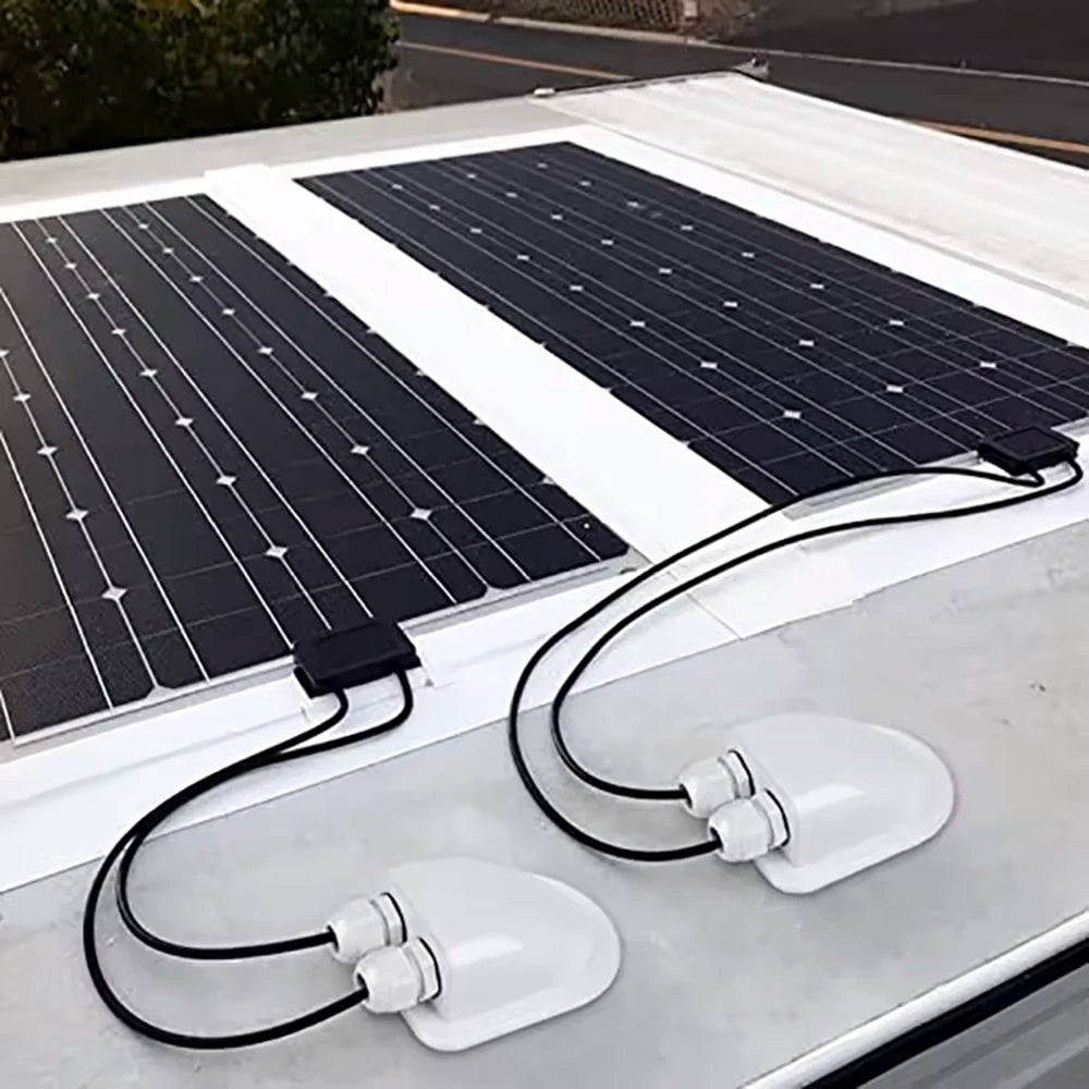 Showing the Double Solar Cable Entry Gland installed on a roof with two solar panels